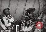 Image of Native American Indian Tribal Council members tell jokes Fort Browning Montana USA, 1930, second 41 stock footage video 65675025317