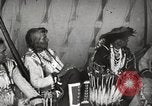 Image of Native American Indian Tribal Council members tell jokes Fort Browning Montana USA, 1930, second 42 stock footage video 65675025317