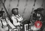 Image of Native American Indian Tribal Council members tell jokes Fort Browning Montana USA, 1930, second 43 stock footage video 65675025317
