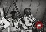 Image of Native American Indian Tribal Council members tell jokes Fort Browning Montana USA, 1930, second 46 stock footage video 65675025317