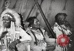 Image of Native American Indian Tribal Council members tell jokes Fort Browning Montana USA, 1930, second 48 stock footage video 65675025317
