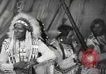 Image of Native American Indian Tribal Council members tell jokes Fort Browning Montana USA, 1930, second 49 stock footage video 65675025317