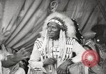 Image of Native American Indian Tribal Council members tell jokes Fort Browning Montana USA, 1930, second 52 stock footage video 65675025317