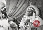 Image of Native American Indian Tribal Council members tell jokes Fort Browning Montana USA, 1930, second 54 stock footage video 65675025317