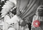 Image of Native American Indian Tribal Council members tell jokes Fort Browning Montana USA, 1930, second 56 stock footage video 65675025317