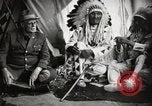 Image of Native American Indian Tribal Council members tell jokes Fort Browning Montana USA, 1930, second 59 stock footage video 65675025317