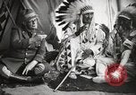 Image of Native American Indian Tribal Council members tell jokes Fort Browning Montana USA, 1930, second 62 stock footage video 65675025317