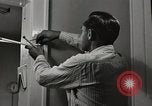Standbild arbeiten die amerikanischen Frauen zu Hause New York United States USA, 1950, aus Sekunde 10 historischem Filmmaterial Videoclip 65675025320