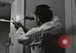 Standbild arbeiten die amerikanischen Frauen zu Hause New York United States USA, 1950, aus Sekunde 13 historischem Filmmaterial Videoclip 65675025320