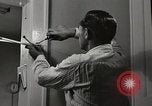 Standbild arbeiten die amerikanischen Frauen zu Hause New York United States USA, 1950, aus Sekunde 14 historischem Filmmaterial Videoclip 65675025320
