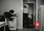 Standbild arbeiten die amerikanischen Frauen zu Hause New York United States USA, 1950, aus Sekunde 15 historischem Filmmaterial Videoclip 65675025320