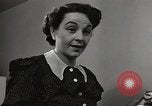 Standbild arbeiten die amerikanischen Frauen zu Hause New York United States USA, 1950, aus Sekunde 25 historischem Filmmaterial Videoclip 65675025320