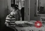 Standbild arbeiten die amerikanischen Frauen zu Hause New York United States USA, 1950, aus Sekunde 29 historischem Filmmaterial Videoclip 65675025320