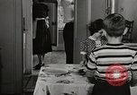 Standbild arbeiten die amerikanischen Frauen zu Hause New York United States USA, 1950, aus Sekunde 34 historischem Filmmaterial Videoclip 65675025320