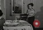 Standbild arbeiten die amerikanischen Frauen zu Hause New York United States USA, 1950, aus Sekunde 45 historischem Filmmaterial Videoclip 65675025320