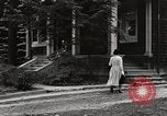 Standbild arbeiten die amerikanischen Frauen zu Hause New York United States USA, 1950, aus Sekunde 59 historischem Filmmaterial Videoclip 65675025320