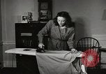 Standbild arbeiten die amerikanischen Frauen zu Hause New York United States USA, 1950, aus Sekunde 62 historischem Filmmaterial Videoclip 65675025320