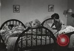 Standbild neuen Tag für arbeiten die amerikanischen Frauen New York United States USA, 1950, aus Sekunde 28 historischem Filmmaterial Videoclip 65675025321