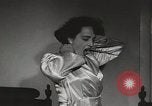 Standbild neuen Tag für arbeiten die amerikanischen Frauen New York United States USA, 1950, aus Sekunde 61 historischem Filmmaterial Videoclip 65675025321