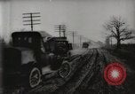Standbild Ford Pkw und Lkw steckt in Schlamm United States USA, 1920, aus Sekunde 8 historischem Filmmaterial Videoclip 65675025336