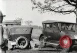 Standbild Ford Pkw und Lkw steckt in Schlamm United States USA, 1920, aus Sekunde 16 historischem Filmmaterial Videoclip 65675025336
