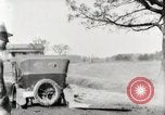 Standbild Ford Pkw und Lkw steckt in Schlamm United States USA, 1920, aus Sekunde 18 historischem Filmmaterial Videoclip 65675025336