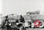 Standbild Ford Pkw und Lkw steckt in Schlamm United States USA, 1920, aus Sekunde 19 historischem Filmmaterial Videoclip 65675025336