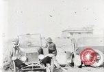 Standbild Ford Pkw und Lkw steckt in Schlamm United States USA, 1920, aus Sekunde 20 historischem Filmmaterial Videoclip 65675025336