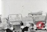 Standbild Ford Pkw und Lkw steckt in Schlamm United States USA, 1920, aus Sekunde 23 historischem Filmmaterial Videoclip 65675025336