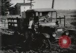 Standbild Ford Pkw und Lkw steckt in Schlamm United States USA, 1920, aus Sekunde 37 historischem Filmmaterial Videoclip 65675025336