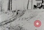 Image of Ford Model T car driving in arduous conditions United States USA, 1922, second 12 stock footage video 65675025340