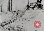 Image of Ford Model T car driving in arduous conditions United States USA, 1922, second 13 stock footage video 65675025340