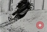 Image of Ford Model T car driving in arduous conditions United States USA, 1922, second 16 stock footage video 65675025340