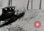 Image of Ford Model T car driving in arduous conditions United States USA, 1922, second 17 stock footage video 65675025340