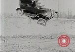 Image of Ford Model T car driving in arduous conditions United States USA, 1922, second 20 stock footage video 65675025340