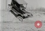 Image of Ford Model T car driving in arduous conditions United States USA, 1922, second 21 stock footage video 65675025340
