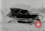 Image of Ford Model T car driving in arduous conditions United States USA, 1922, second 22 stock footage video 65675025340