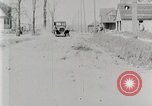 Image of Ford Model T car driving in arduous conditions United States USA, 1922, second 24 stock footage video 65675025340