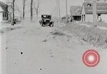 Image of Ford Model T car driving in arduous conditions United States USA, 1922, second 25 stock footage video 65675025340