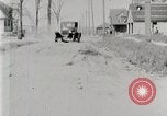 Image of Ford Model T car driving in arduous conditions United States USA, 1922, second 26 stock footage video 65675025340
