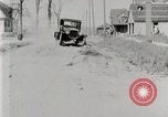 Image of Ford Model T car driving in arduous conditions United States USA, 1922, second 28 stock footage video 65675025340