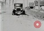 Image of Ford Model T car driving in arduous conditions United States USA, 1922, second 31 stock footage video 65675025340