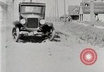 Image of Ford Model T car driving in arduous conditions United States USA, 1922, second 33 stock footage video 65675025340