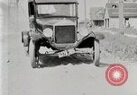 Image of Ford Model T car driving in arduous conditions United States USA, 1922, second 34 stock footage video 65675025340