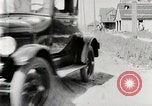 Image of Ford Model T car driving in arduous conditions United States USA, 1922, second 35 stock footage video 65675025340