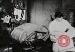 Standbild motorisierte Waschmaschine Staubsauger und Spinning Wheel United States USA, 1920, aus Sekunde 4 historischem Filmmaterial Videoclip 65675025347