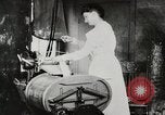Standbild motorisierte Waschmaschine Staubsauger und Spinning Wheel United States USA, 1920, aus Sekunde 22 historischem Filmmaterial Videoclip 65675025347