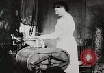 Standbild motorisierte Waschmaschine Staubsauger und Spinning Wheel United States USA, 1920, aus Sekunde 27 historischem Filmmaterial Videoclip 65675025347