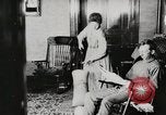 Standbild motorisierte Waschmaschine Staubsauger und Spinning Wheel United States USA, 1920, aus Sekunde 31 historischem Filmmaterial Videoclip 65675025347