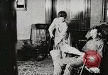 Standbild motorisierte Waschmaschine Staubsauger und Spinning Wheel United States USA, 1920, aus Sekunde 32 historischem Filmmaterial Videoclip 65675025347